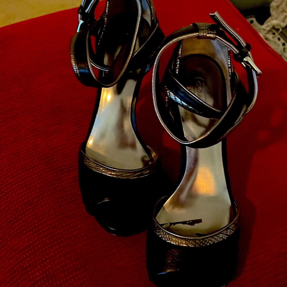 Coach size 8.5 black heels.